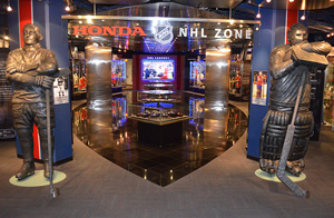 Statues of Cyclone Taylor and Ken Dryden welcome guests to the NHL Legends section within the Honda NHL Zone.