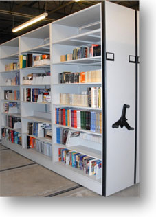 The D.K. Doc Seaman Hockey Resource Centre's Artifact Storage Area has revolving high density shelving that creates an efficient method for Resource Centre staff to retrieve relevant materials for any hockey project.