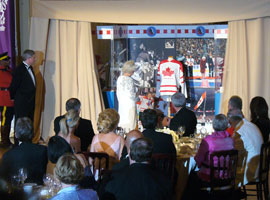 Members of the Hall of Fame staff presented Queen Elizabeth II with an honourary Team Canada jersey adorned with her own royal crest. 