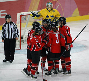 Canadian players celebrating after a goal against Sweden in the gold medal game at the 2006 Olympic Winter Games in Turin, Italy