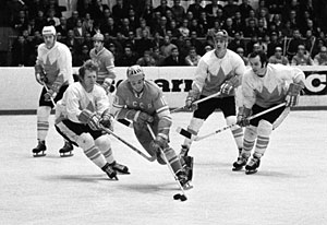 Alexander Maltsev of the Soviet Union skates with the puck while Canada's Pat Stapleton defends during 1972 Summit Series game action at Luzhniki Ice Palace in Moscow.