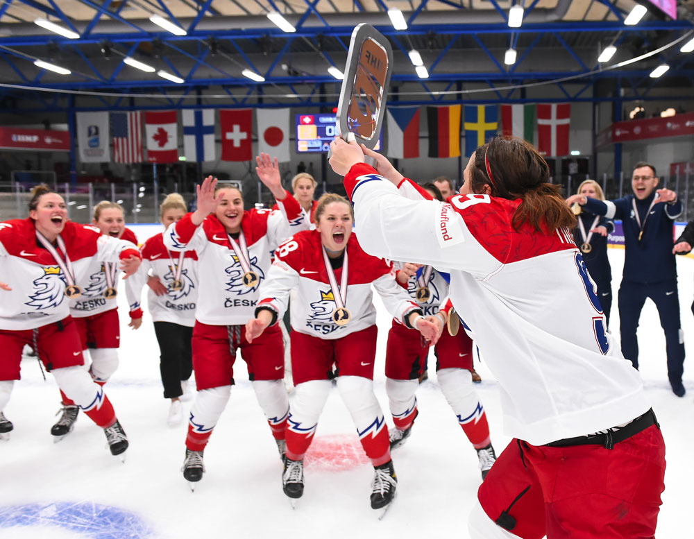 Alena Mills and Team Czechia celebrate a historic bronze medal at the 2022 IIHF Ice Hockey Women’s World Championship.